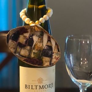 Handmade decoupage seashell ornament.